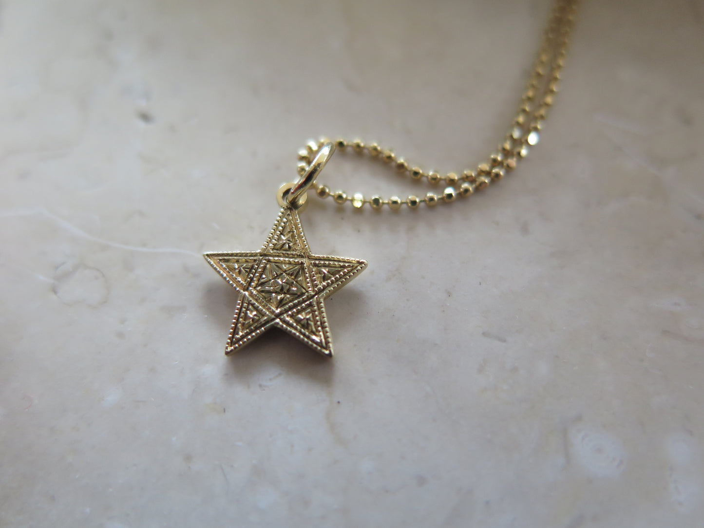 Colgante Estrella grabada